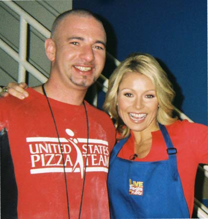 John
                Howe and Kelly Ripa on set